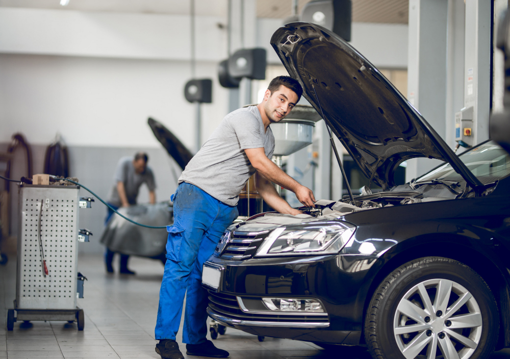 Vehicle being professionally serviced in a modern automotive workshop